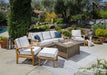 The Tortuga Outdoor 6-Piece Indonesian Teak Sofa and Fire Table Set - Canvas Natural or Navy is the epitome of luxury retreat for your patio. This exquisite patio furniture set by Tortuga Outdoor includes a table and chairs, providing both style and comfort.