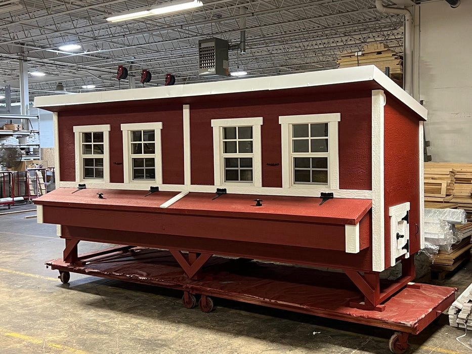 Front view of the OverEZ Jumbo Chicken Coop displaying multiple windows and secure doors, perfect for housing up to 30 chickens.