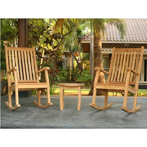 Two Tortuga Outdoor Jakarta 3-Piece Wood Rocking Chair Sets on a patio, featuring durable construction.