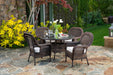 Tortuga Outdoor Sea Pines 5-Piece Outdoor Wicker Dining Set - Java on a patio
