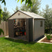 A Lifetime 11 Ft. X 11 Ft. Outdoor Storage Shed - 6433 with a bike in it.