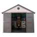 A Lifetime 11 Ft. X 11 Ft. Outdoor Storage Shed - 6433 with a lawn mower in it.
