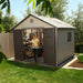 A woman is standing in front of a Lifetime 11 Ft. X 11 Ft. Outdoor Storage Shed - 6433.