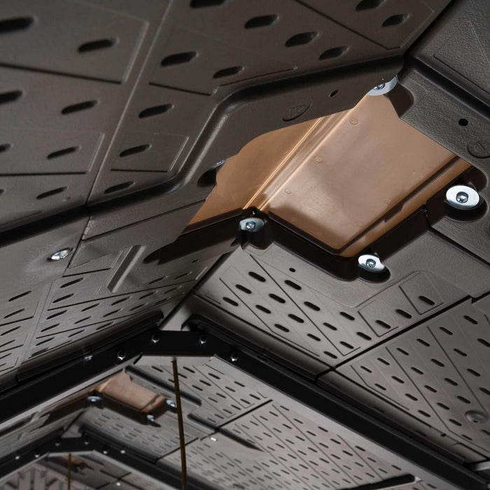A Lifetime metal ceiling in a car with holes in it.