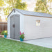 A Lifetime 8 Ft. X 15 Ft. Outdoor Storage Shed - 60075 in a backyard.