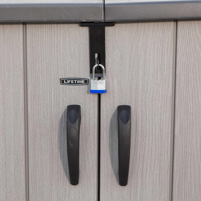 A Lifetime Horizontal Storage Shed - 60296U with a padlock attached to it.