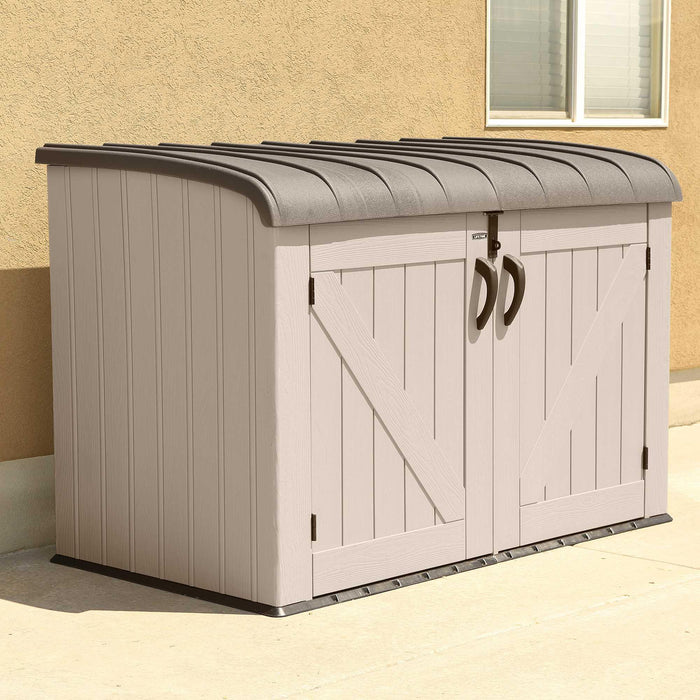 A Lifetime Horizontal Storage Shed (75 Cubic Feet) - 60170 with a door on it.