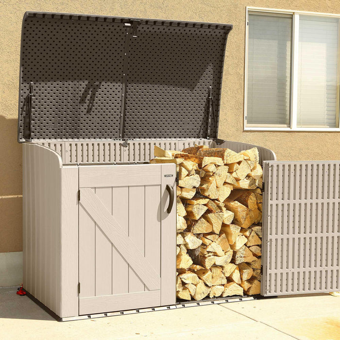 A Lifetime Horizontal Storage Shed (75 Cubic Feet) - 60170 with logs in it.