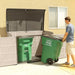 A man pushing a bin to a Lifetime Horizontal Storage Shed (75 Cubic Feet) - 60170.