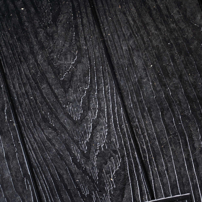 A close up of a black wood floor featuring the Lifetime Utility Shed - 60331U.