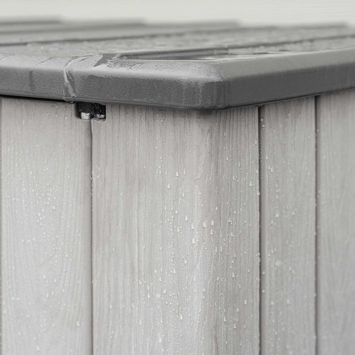 A close up of a Lifetime Utility Shed - 60331U with rain drops on it.