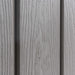 A close up view of a Lifetime Utility Shed - 60331U gray wood siding.