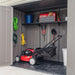 A Lifetime Utility Shed - 60331U with a lawn mower in it.