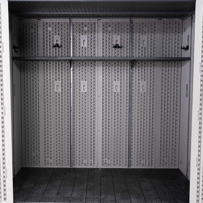 A Lifetime Utility Shed - 60331U with a door open and shelves on the floor.