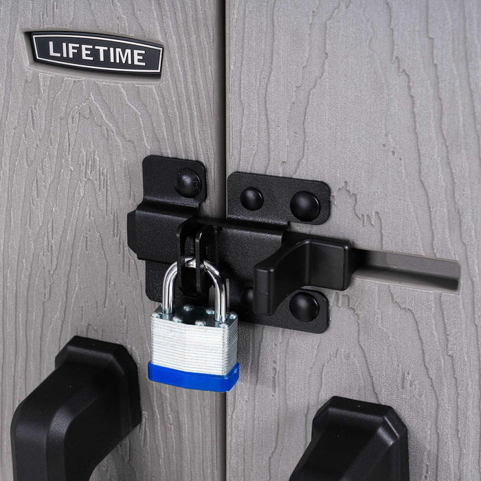 A padlock is attached to the door of a Lifetime Utility Shed - 60331U.