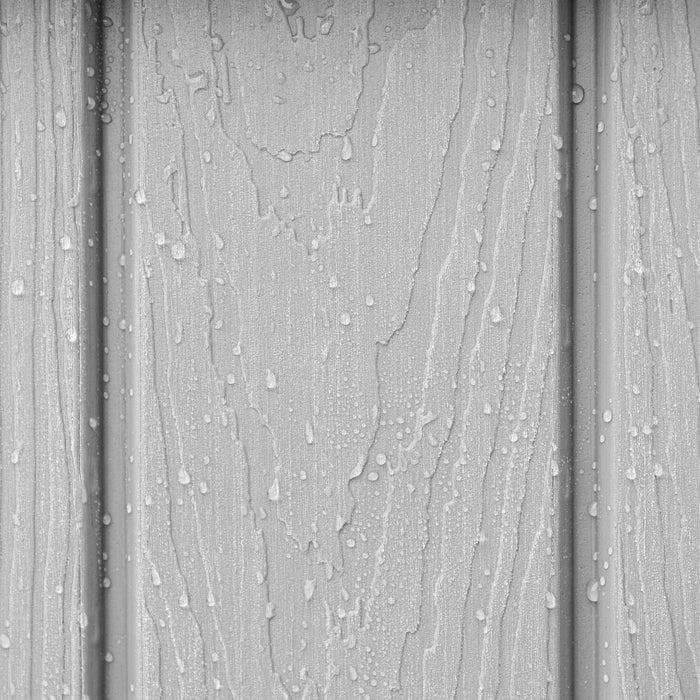 A black and white photo of Lifetime Utility Shed - 60331U rain drops on a wooden wall.
