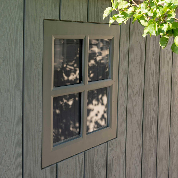 A close up detail of the window of a storage cabin