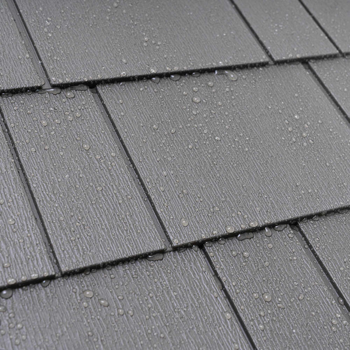 A gray Lifetime shingled roof with water droplets on it.