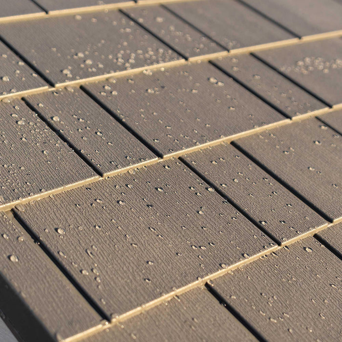 A close up of a cabin roof with water droplets