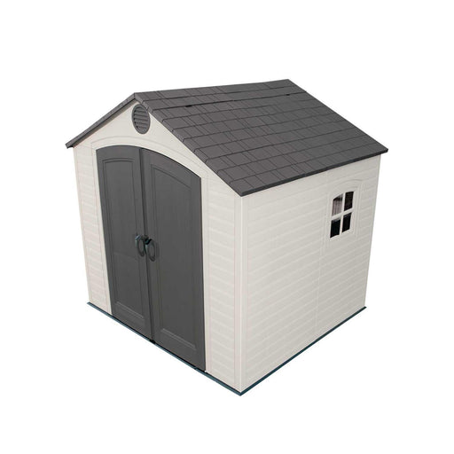 Front view of a storage shed featuring closed doors on a white background.
