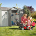 A Lifetime 10 Ft. X 8 Ft. Outdoor Storage Shed - 60243 on the grass.
