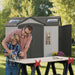 A man and a boy working on a Lifetime 10 Ft. X 8 Ft. Outdoor Storage Shed - 60001.