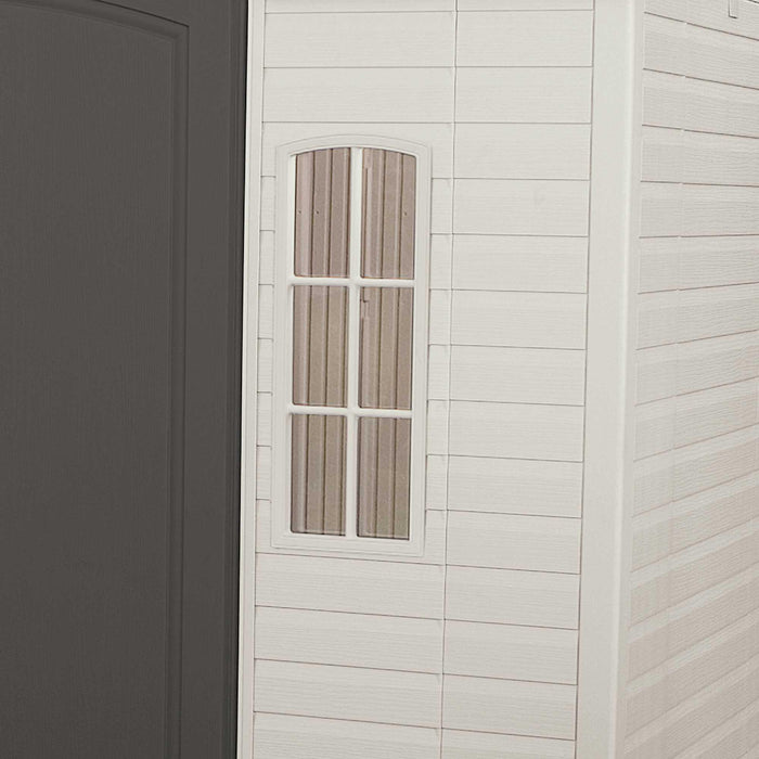 A Lifetime 10 Ft. X 8 Ft. Outdoor Storage Shed - 60001 with a black door and window.