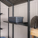 A Lifetime metal storage shed with shelves and a shovel.