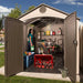 A woman in a Lifetime 15 Ft. X 8 Ft. Outdoor Storage Shed - 60079.