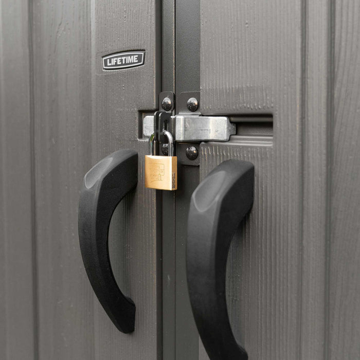 A Lifetime 15 Ft X 8 Ft Outdoor Storage Shed - 60318 with a lock and padlock on it.