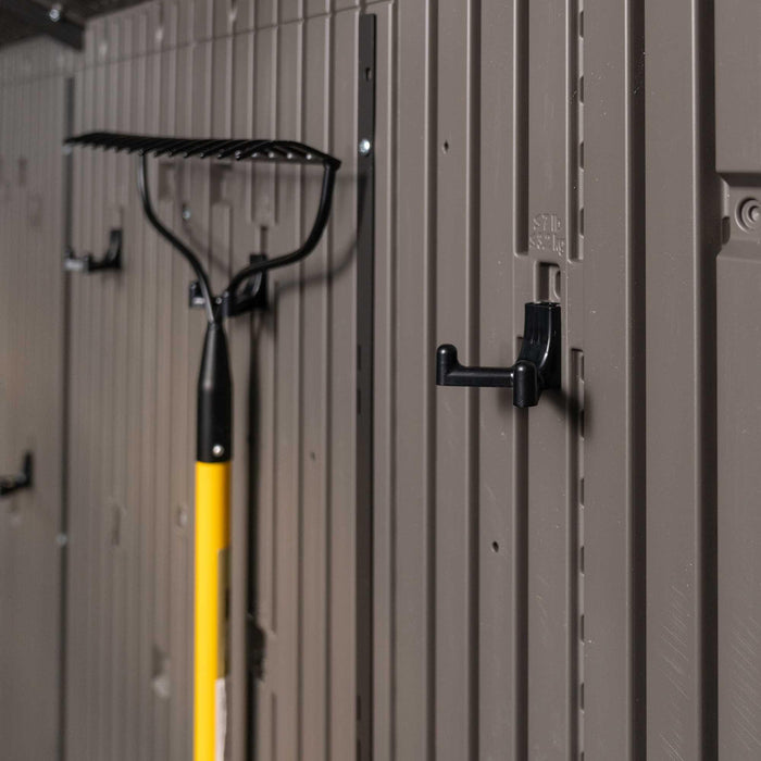 A Lifetime 15 Ft X 8 Ft Outdoor Storage Shed - 60318 hanging on the wall of a storage shed.