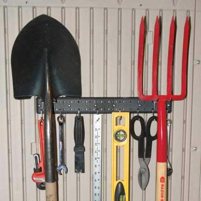 Tools hanging on a Lifetime 16 In. Peg Strips With Hooks