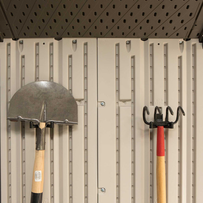 Two equipment hanging on the walls of Lifetime 17.5 Ft. X 8 Ft. Outdoor Storage Shed