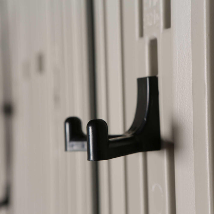 A black Lifetime hook hangs on the side of a locker.