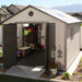 A Lifetime 11 Ft. X 13.5 Ft. Outdoor Storage Shed - 6415 in a backyard.