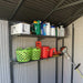 A Lifetime 11 Ft. X 13.5 Ft. Outdoor Storage Shed - 6415 with baskets and buckets on the shelves.