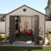 A backyard with a Lifetime 11 Ft. X 13.5 Ft. Outdoor Storage Shed - 6415.