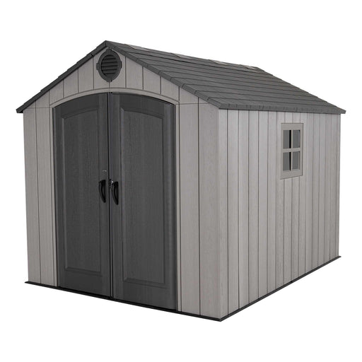 Front view of a storage cabin featuring a window on a white background