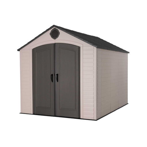 Front view of a storage shed featuring closed doors on a white background