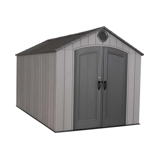 Front view of a storage shed featuring closed doors on a white background.