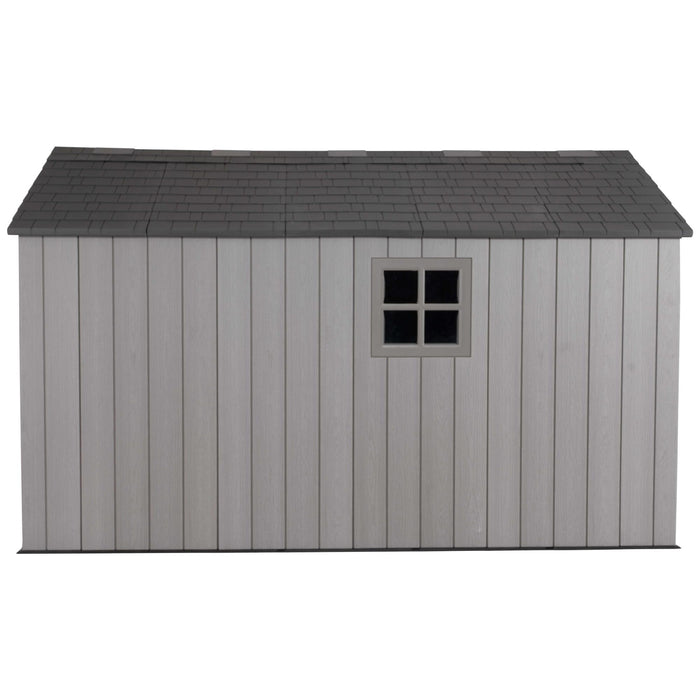 Side view of a storage cabin featuring a window on a white background