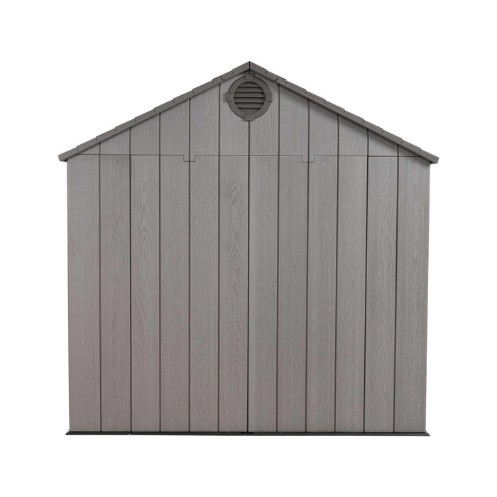 A rear view of a cabin featuring a vent in a white background