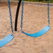 Close-up of blue swings on the Lifetime Adventure Castle playset.