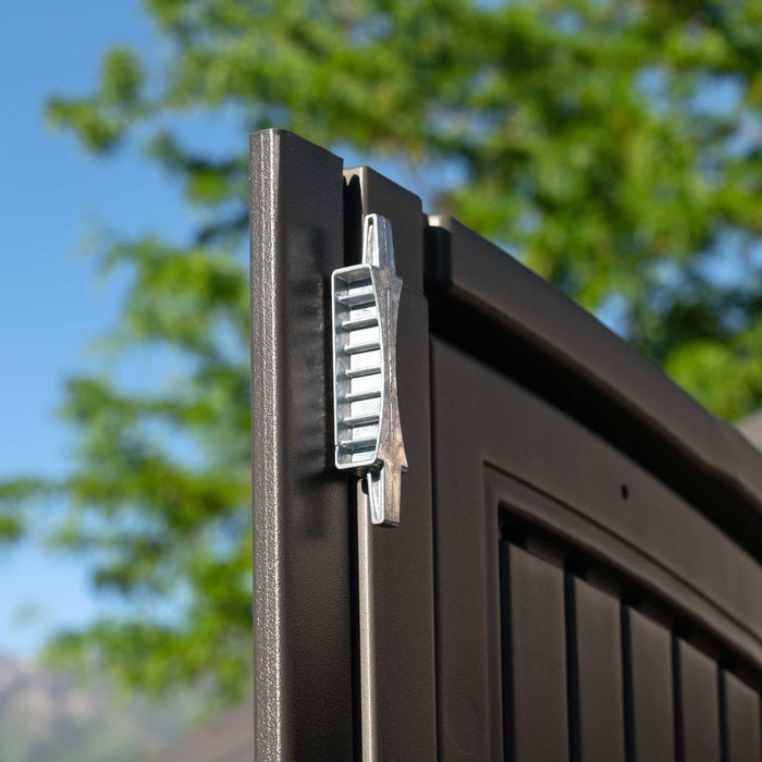 A close up of a Lifetime 10 Ft. X 8 Ft. Outdoor Storage Shed - 60005 with a lock on it.