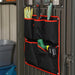 A Lifetime 10 Ft. X 8 Ft. Outdoor Storage Shed - 60118 hanging on the side of a garage door.