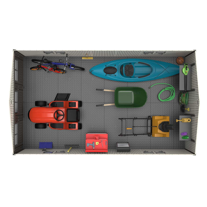A view of a garage with various Lifetime 11 Ft. X 18.5 Ft. Outdoor Storage Shed - 60236 tools and equipment.