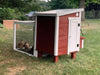 Back elevation of the OverEZ Chicken Coop In A Box, highlighting the EOEZCKCP model's window and entryway for up to 5 chickens.