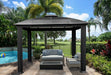 Cambridge Gazebo provides a shaded poolside seating area, complete with contemporary furniture in a tropical garden setting.