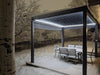 A Bon Pergola Villa Pergola in the snow with table and chairs.