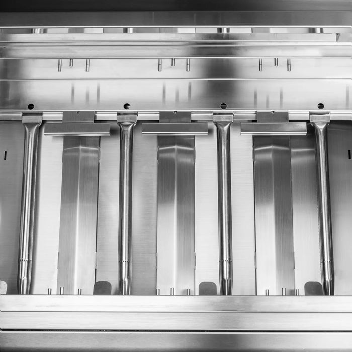 A black and white photo of a Blaze Grills Prelude LBM 3-4 Burner Gas Grill featuring burners.